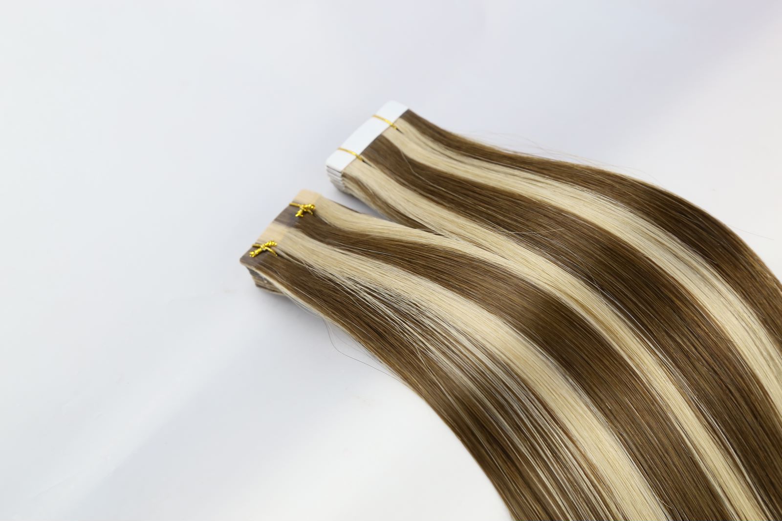 Cinta Remy en extensiones de colores.